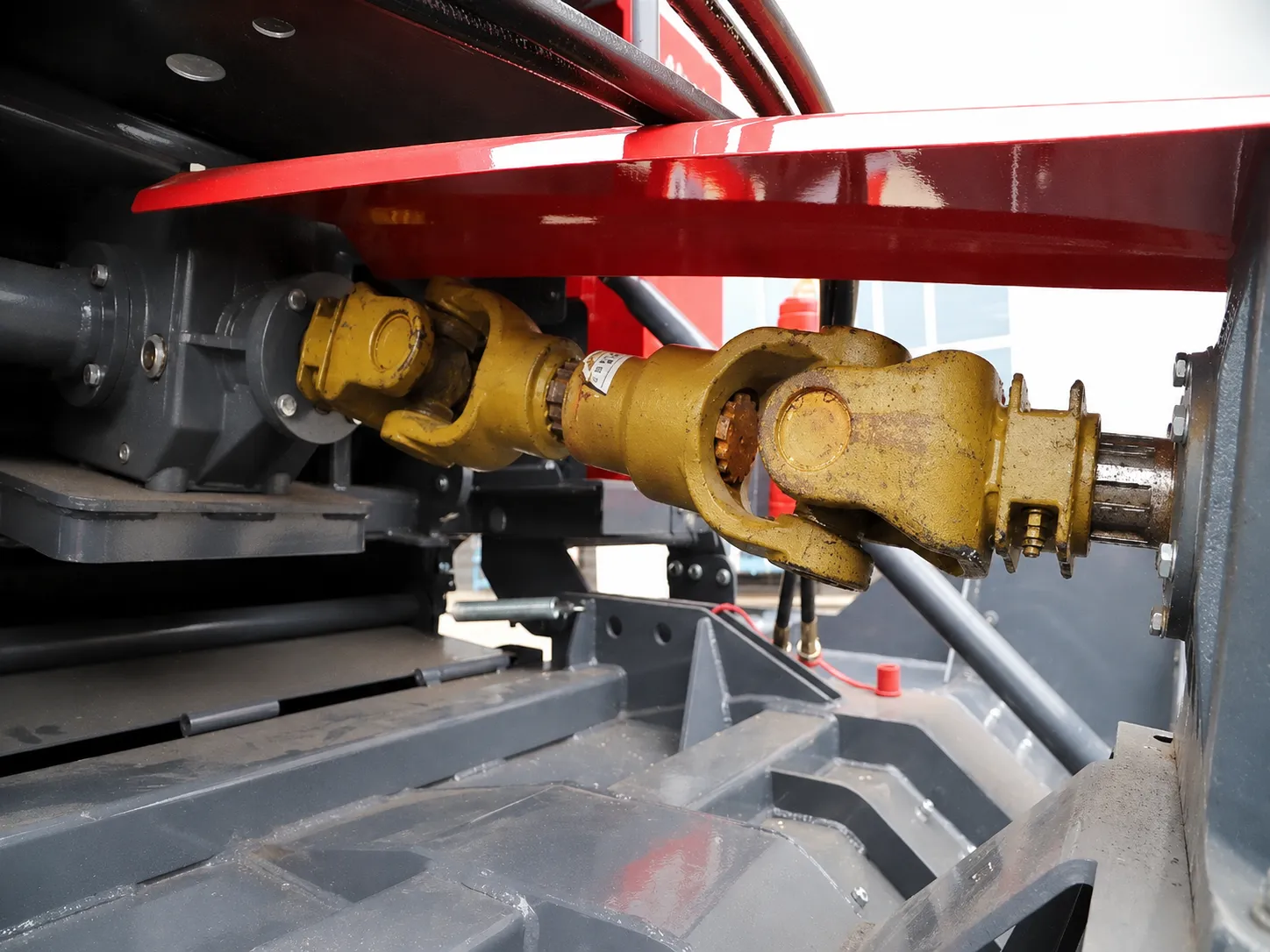 Hydraulic system and PTO driveshaft detail on square baler