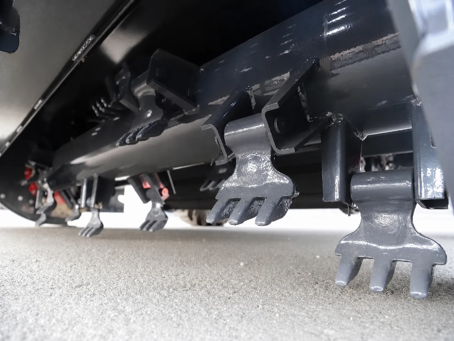 Patented axial-flow spring-tooth pickup mechanism